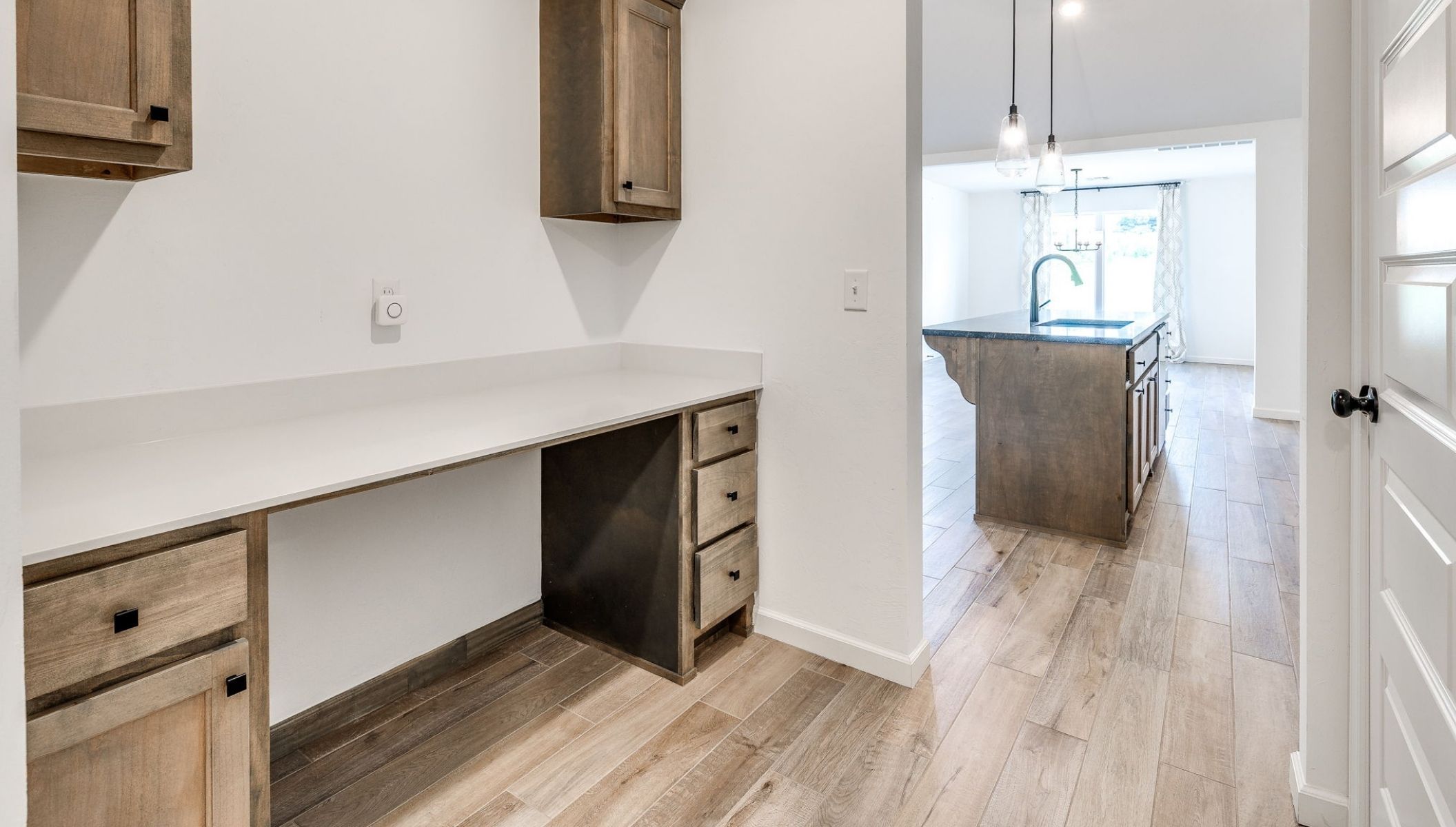 desk with stained cabinets