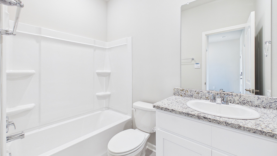 Tour the lovely Ozark plan at 113 Esson Drive in Picard Farms new home community in Maurice, LA