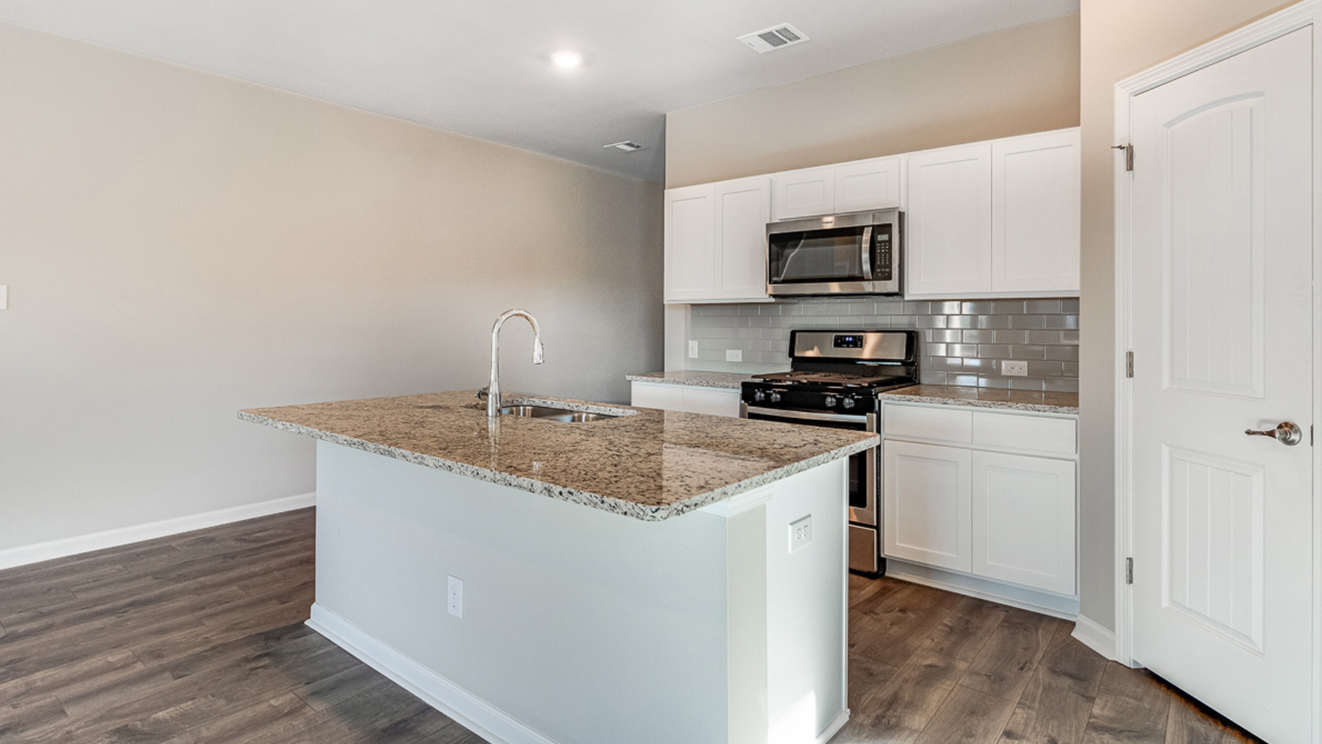 The 2 story Rosemont plan is located in Coteau Ridge new home community