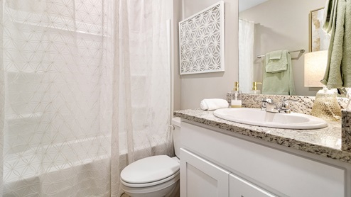 Bathroom with granite and tile