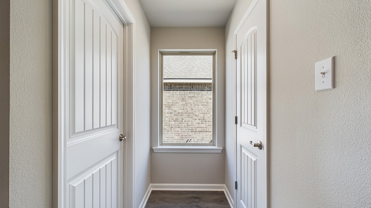 The Kingston Plan is a spacious 4-bedroom home in Duson