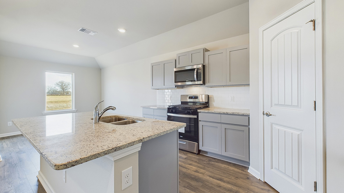 The 4 bed 2 bath Fargo plan is located in Harvest Trace