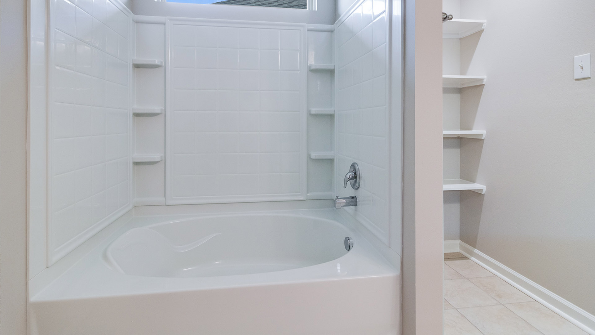 Owner’s ensuite in a D.R. Horton new build home offers function and style with a walk-in closet, spa-like ensuite