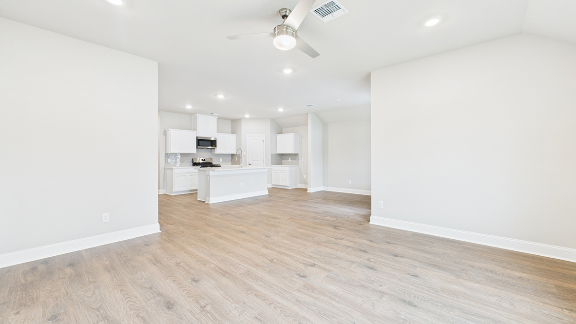 Open concept first floor with the living room and kitchen next to each other