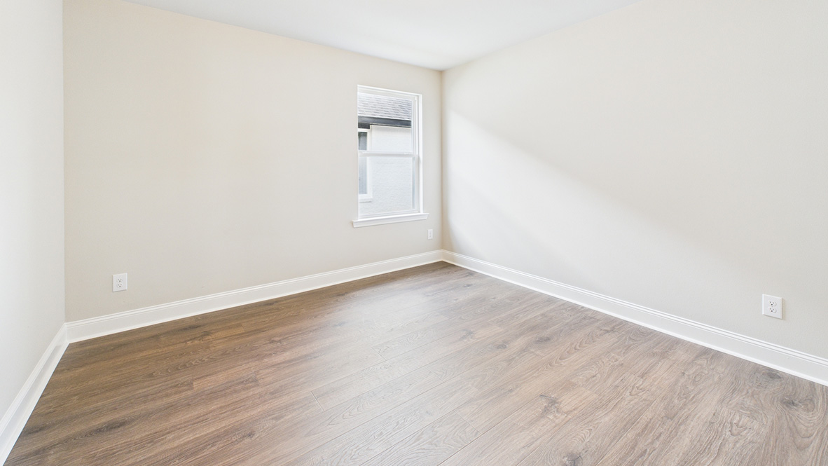 Second bedroom in Ridgeland  showcases soft carpet, a single closet, soft window light, multi-use potential