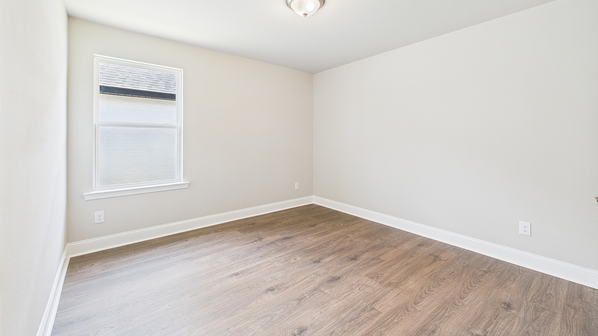 Second bedroom, flex-office, study, entertainment, game, craft room options in this D.R. Horton new construction home