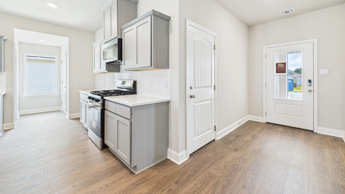 New appliances included, our larger kitchen island with seating anchor the kitchen, next to dining, great rooms, pantry