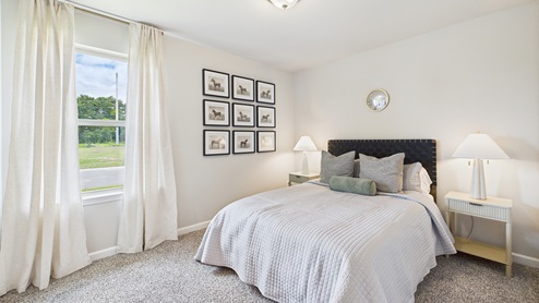 Bedrooms with carpet and spacious closet
