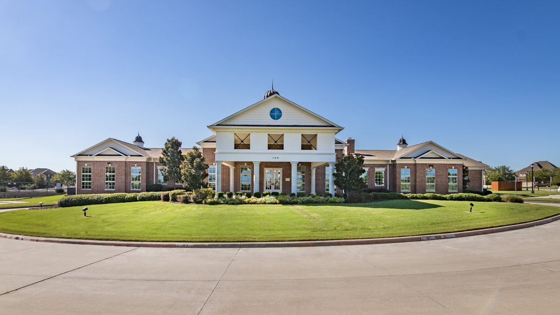 Williamsburg amenity center with a big green lawn