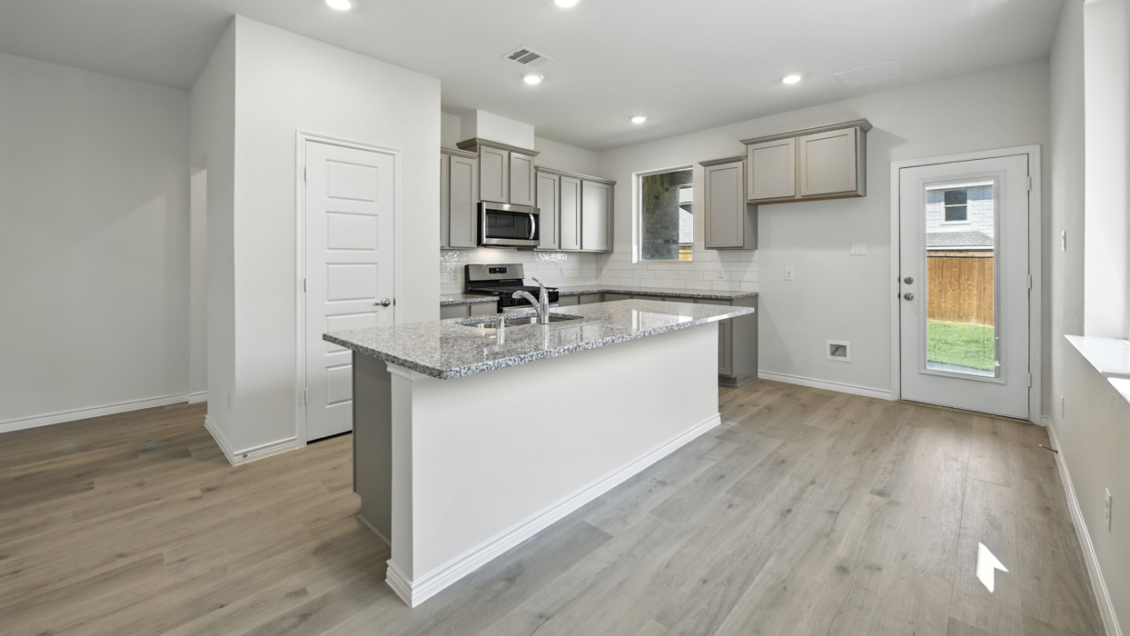 Stafford Floorplan Elevation A Kitchen Gallery Image - Winchester Crossing in Princeton, TX