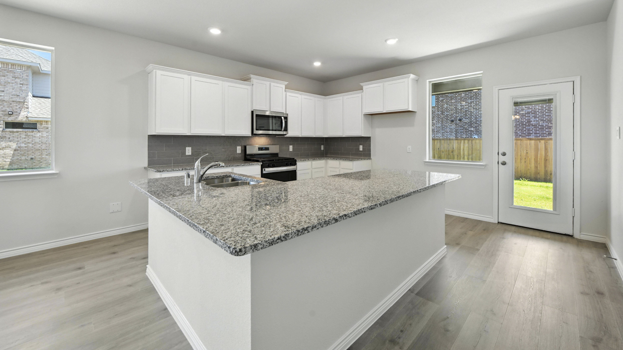 Republic Floorplan Elevation B Kitchen Gallery Image - Winchester Crossing in Princeton, TX