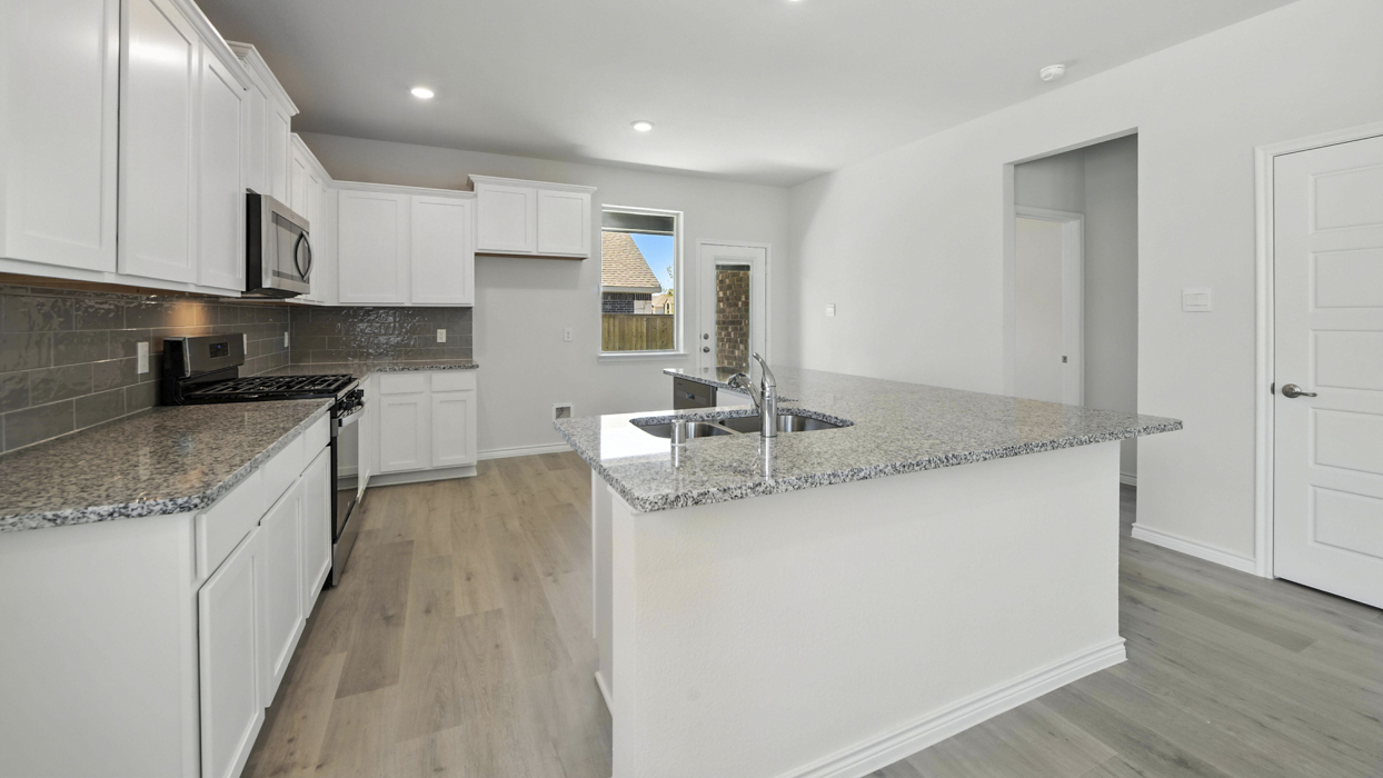 Republic Floorplan Elevation B Kitchen Gallery Image - Winchester Crossing in Princeton, TX
