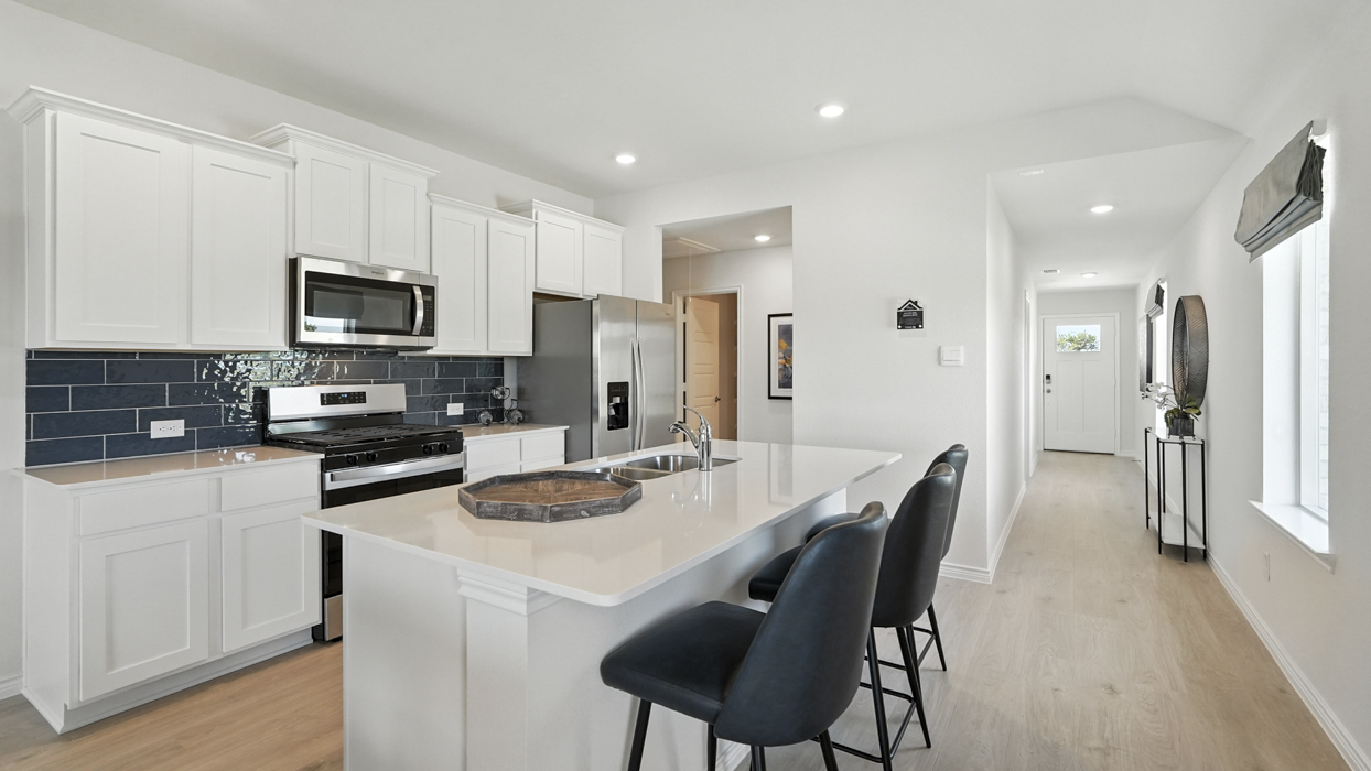 Camila Floorplan Elevation E Kitchen Gallery Image - Winchester Crossing in Princeton, TX