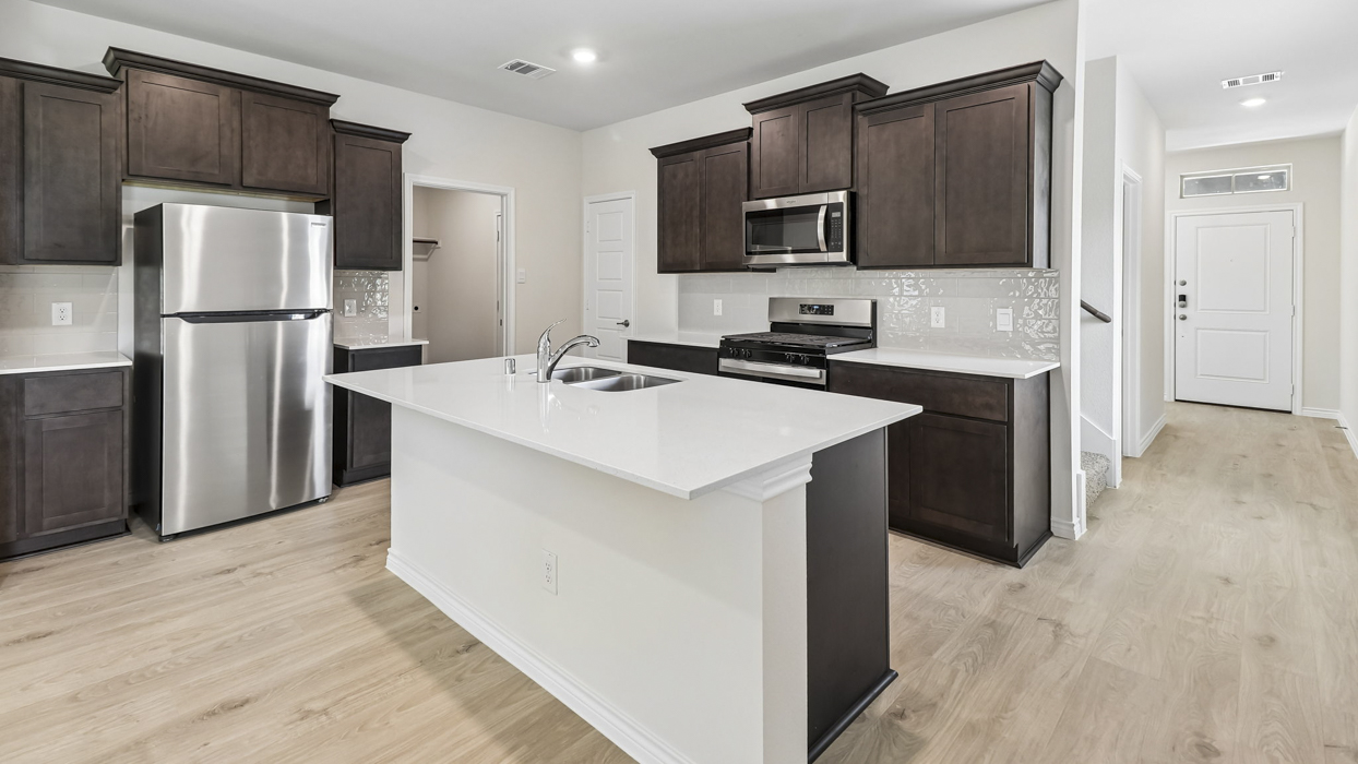 Finn Floorplan Elevation E Kitchen Gallery Image - Winchester Crossing in Princeton, TX