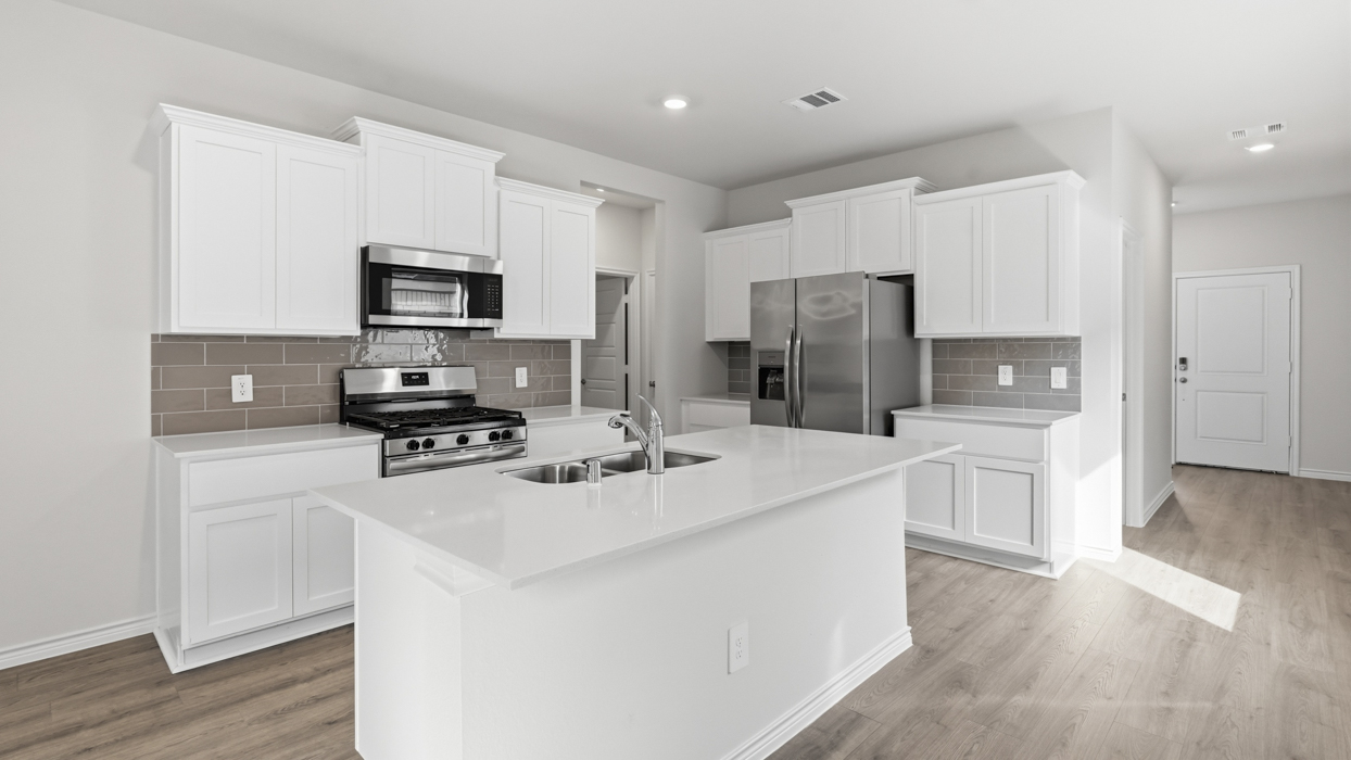 Jackson Floorplan Elevation E Kitchen Gallery Image - Winchester Crossing in Princeton, TX