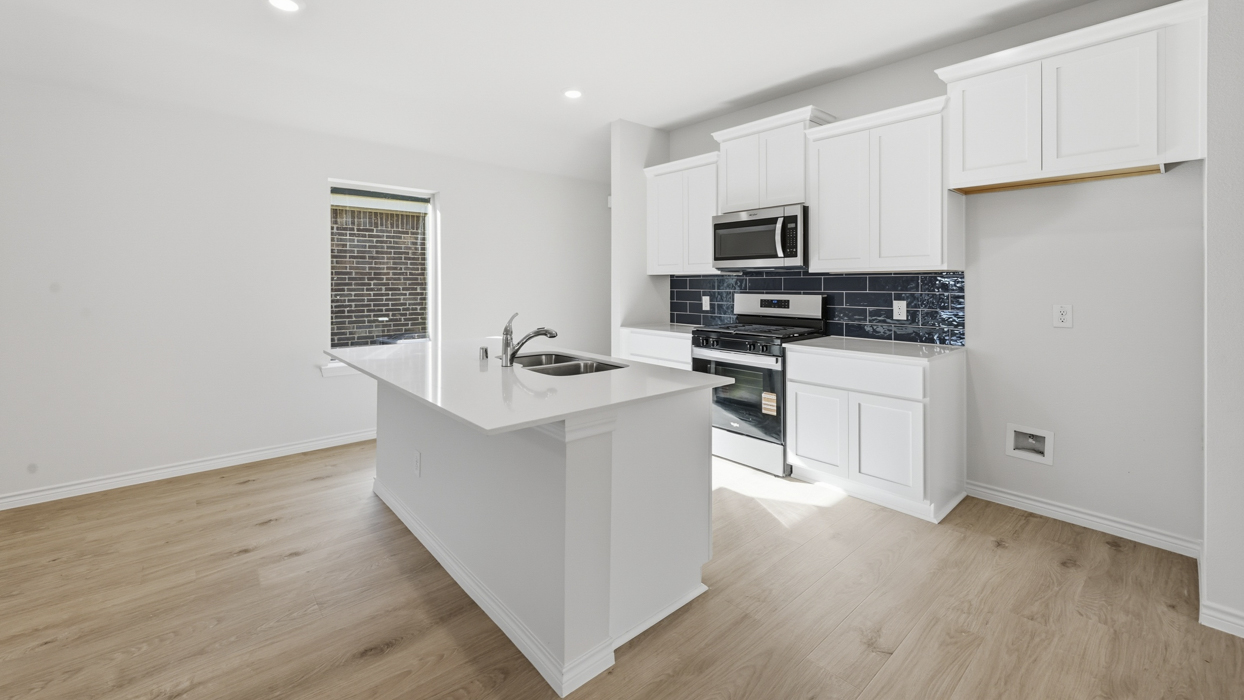 Orion Floorplan Elevation E Kitchen Gallery Image - Winchester Crossing in Princeton, TX