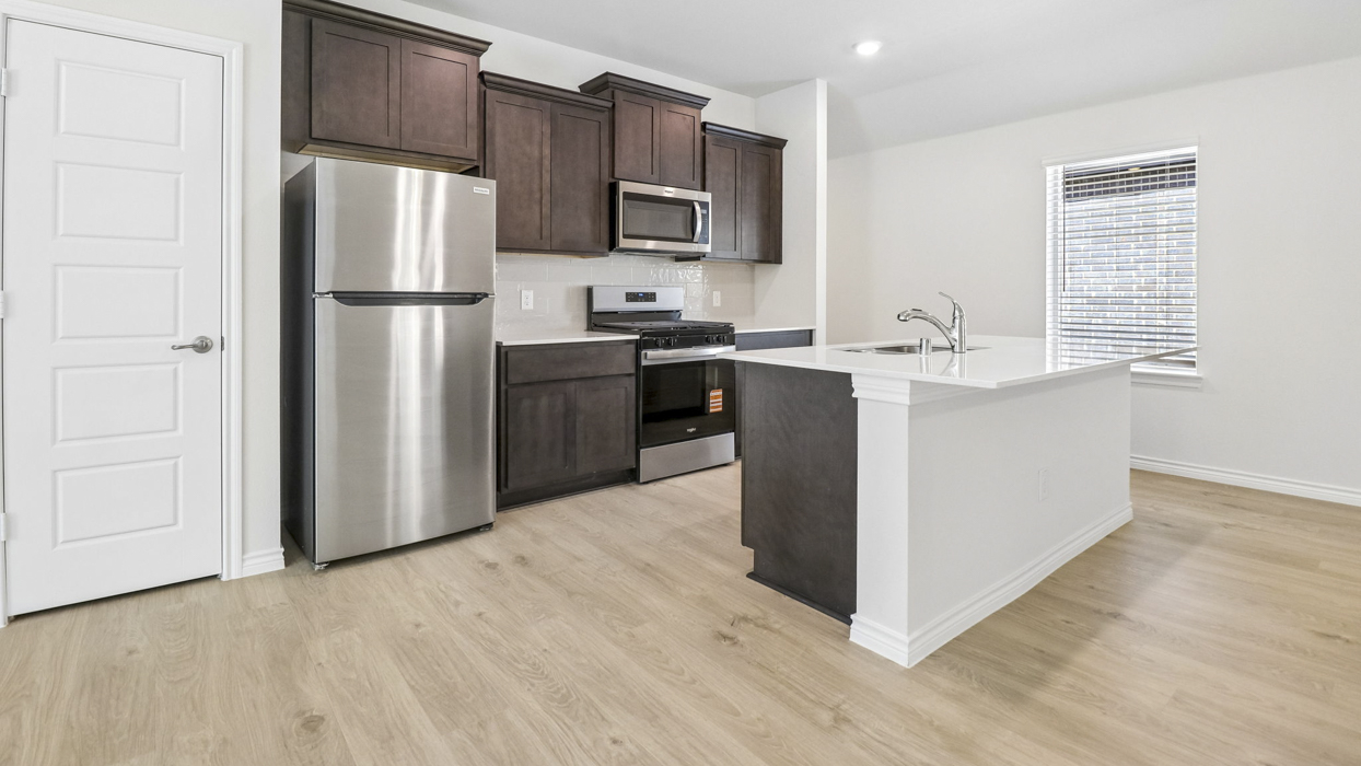 Orion Floorplan Elevation E Kitchen Gallery Image - Winchester Crossing in Princeton, TX