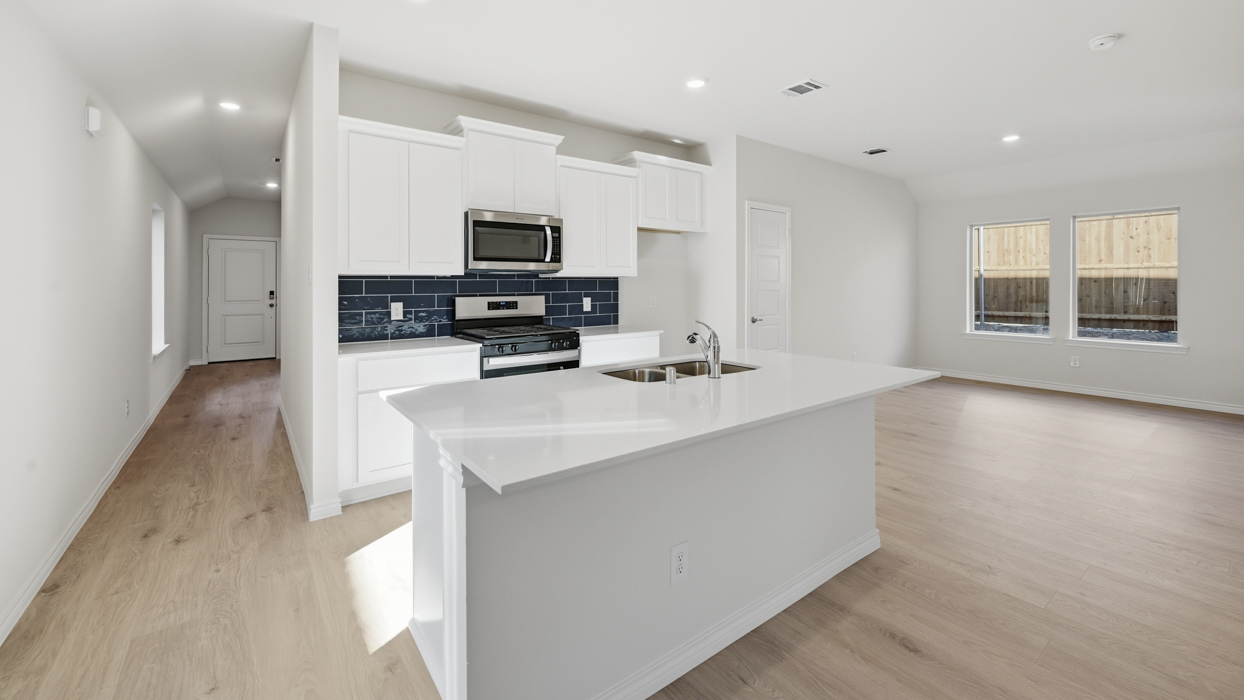 Orion Floorplan Elevation E Kitchen Gallery Image - Winchester Crossing in Princeton, TX