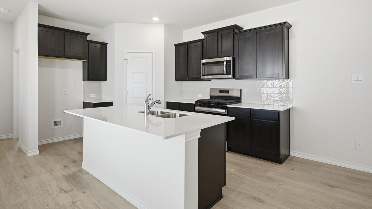 Douglas Plan  Kitchen Gallery Image-Silverado in Aubrey, TX