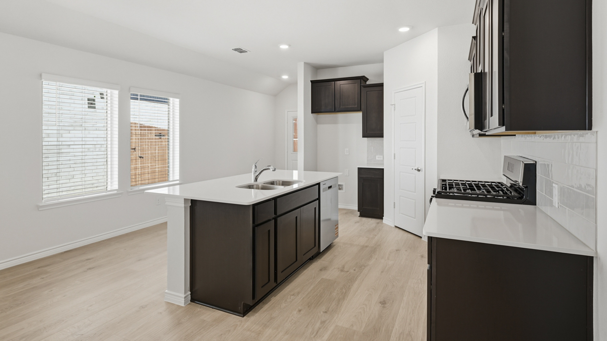 Douglas Plan  Kitchen Gallery Image-Silverado in Aubrey, TX