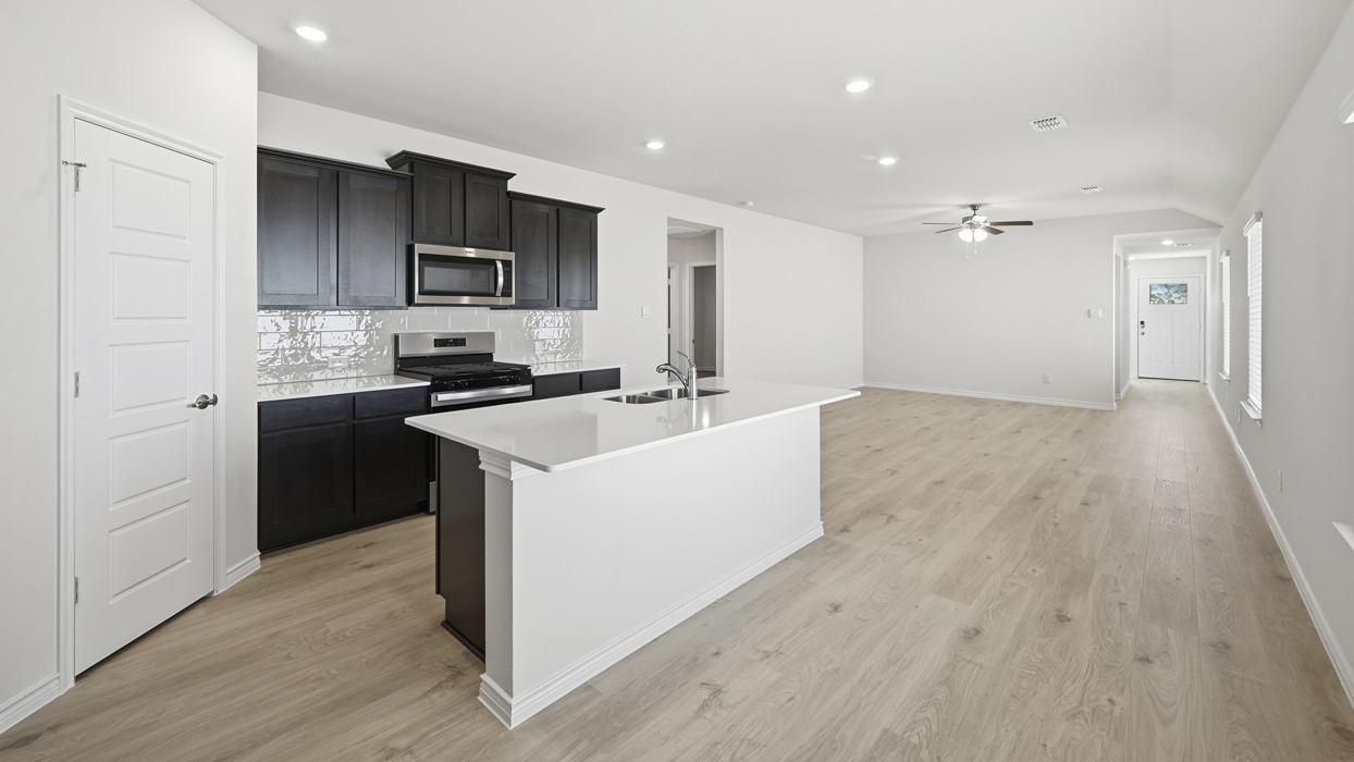 Douglas Plan  Kitchen Gallery Image-Silverado in Aubrey, TX