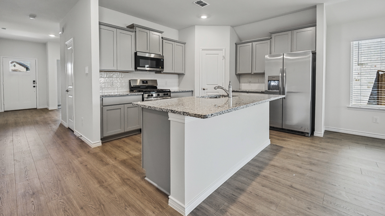 Violet Floorplan Elevation E Kitchen Gallery Image - Silverado in Aubrey, TX