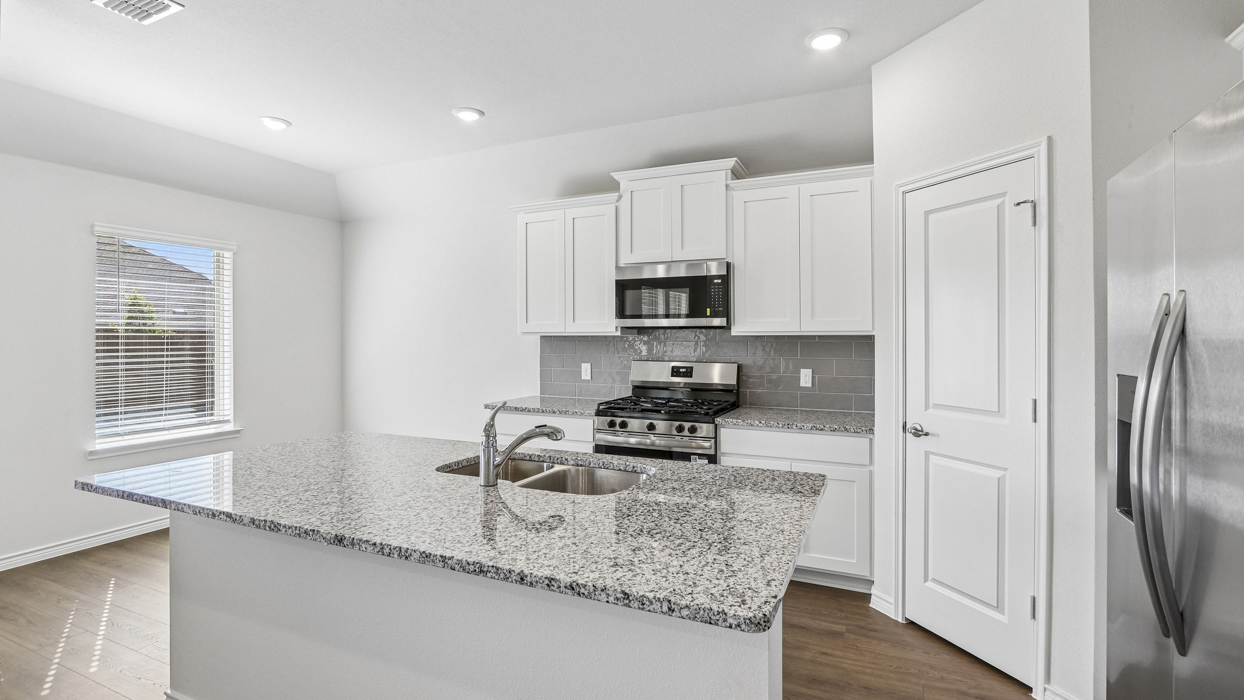 Hale Floorplan Elevation C Kitchen Gallery Image - Silverado in Aubrey, TX