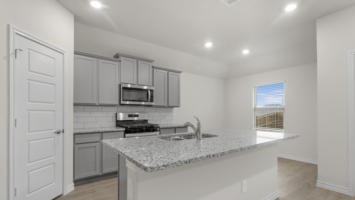 Hale Floorplan Elevation B Kitchen Gallery Image - Silverado in Aubrey, TX