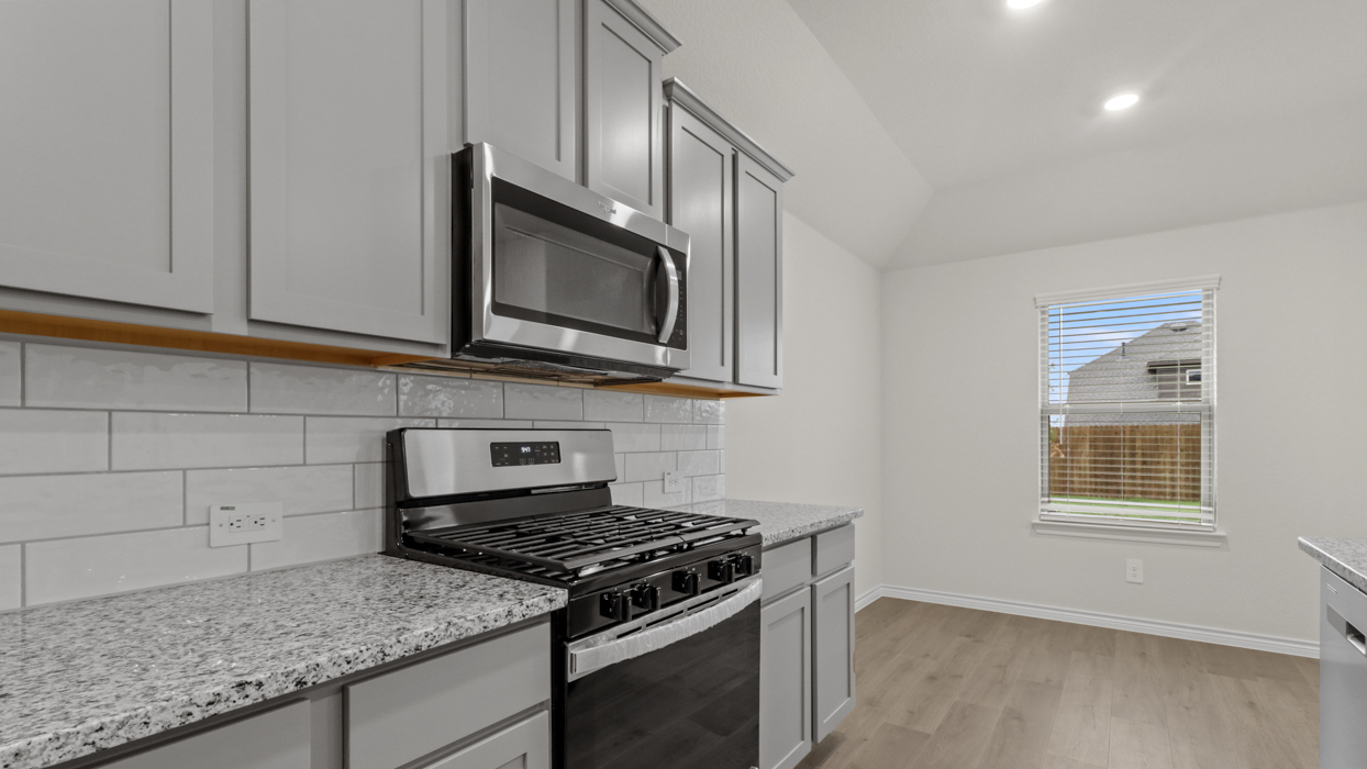 Hale floorplan Kitchen Gallery Image-Silverado in Aubrey Tx