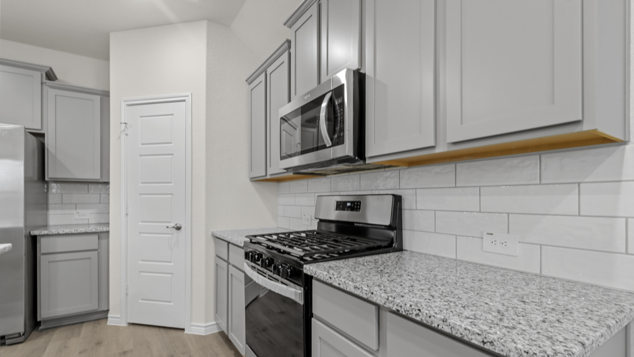 Hale floorplan Kitchen Gallery Image-Silverado in Aubrey Tx