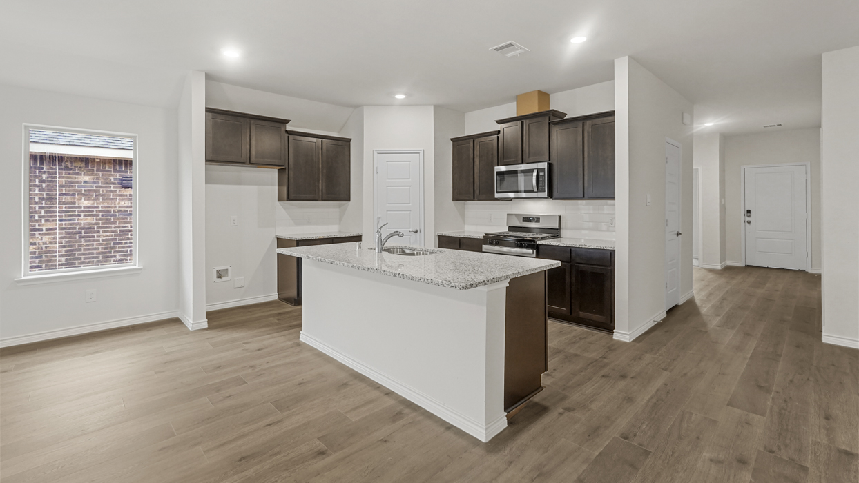 Violet Floorplan Elevation B Kitchen Gallery Image - Silverado in Aubrey, TX