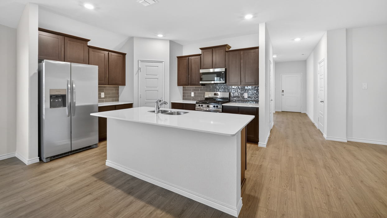 Violet Floorplan Elevation B Kitchen Gallery Image - Silverado in Aubrey, TX