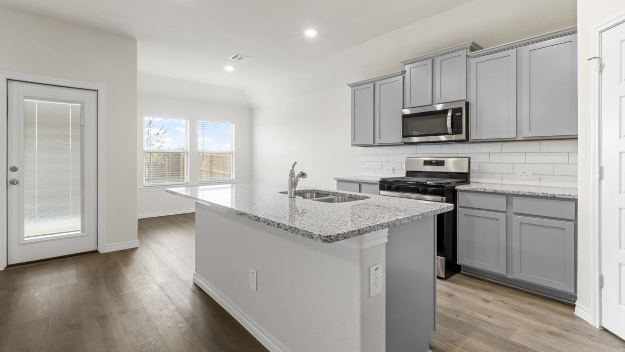 Cedarwood Floorplan Elevation B Kitchen Gallery Image - Silverado in Aubrey, TX