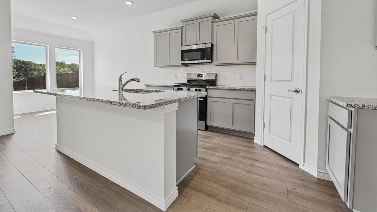 Cedarwood Floorplan Elevation B Kitchen Gallery Image - Silverado in Aubrey, TX