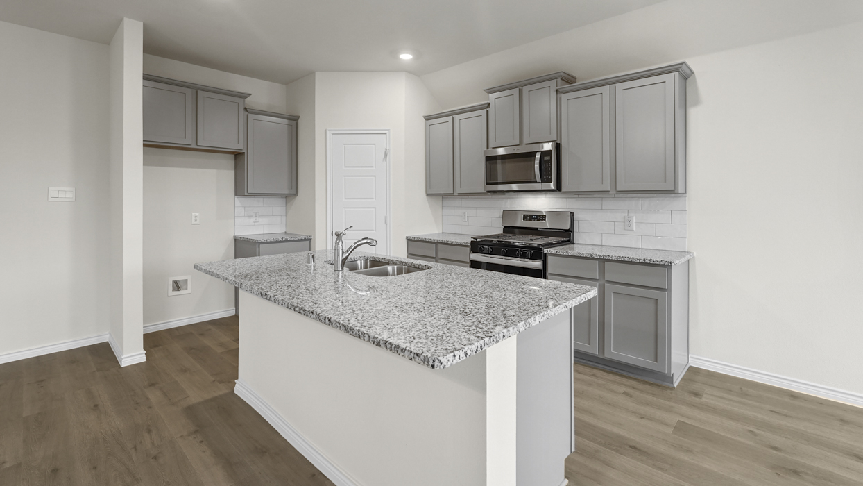 Cedarwood Floorplan Elevation B Kitchen Gallery Image - Silverado in Aubrey, TX