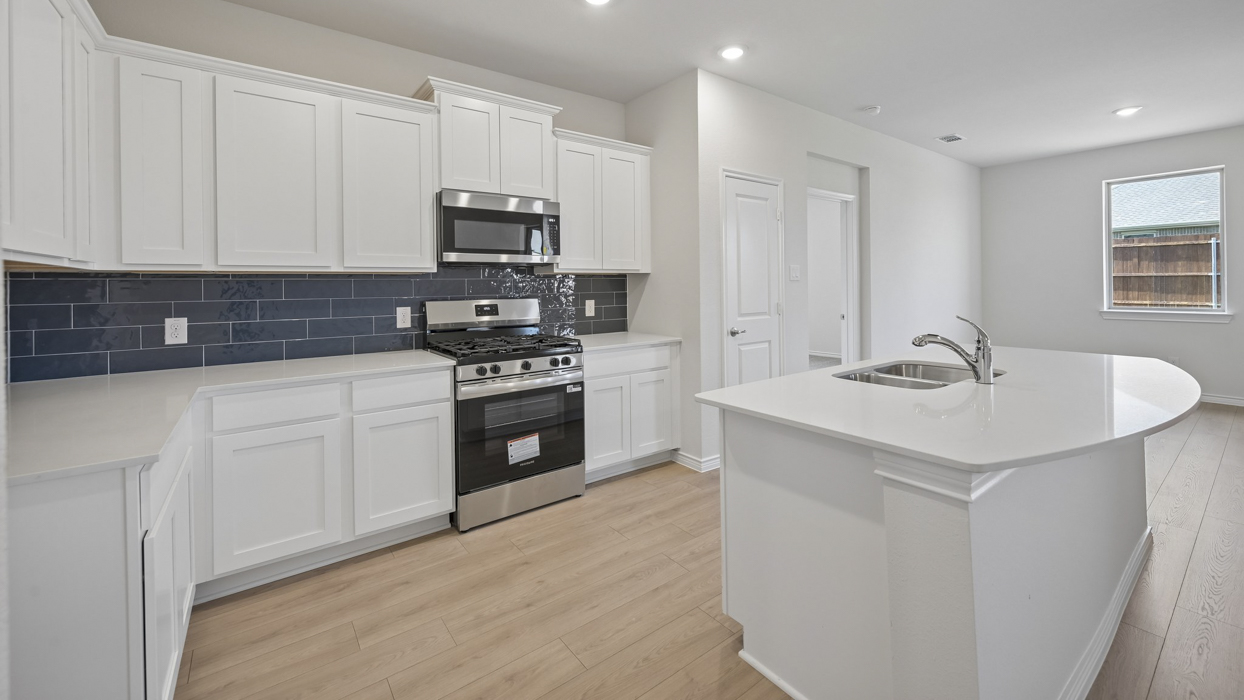 Rivington Floorplan Elevation E Kitchen Gallery Image - Silverado in Aubrey, TX