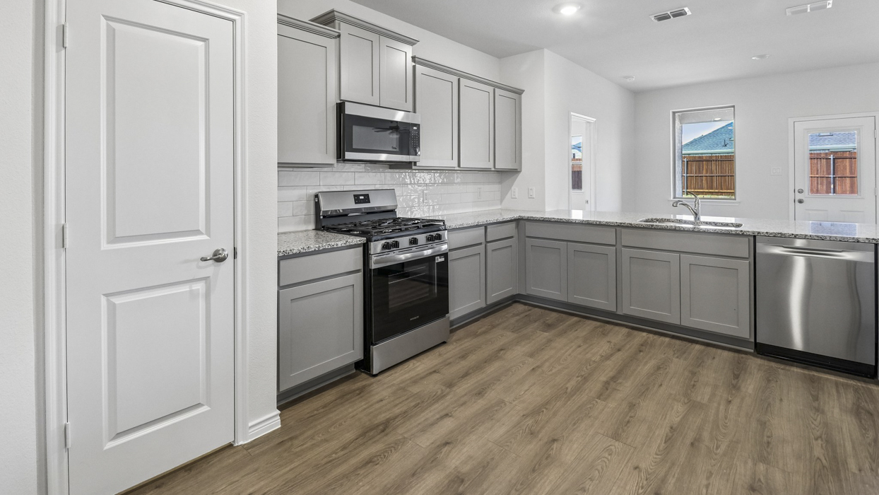 Medbourne Floorplan Elevation A Kitchen Gallery Image - Silverado in Aubrey, TX