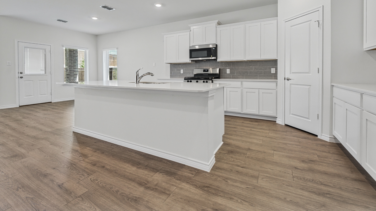 Ivery II Floorplan Elevation B Kitchen Gallery Image - Silverado in Aubrey, TX