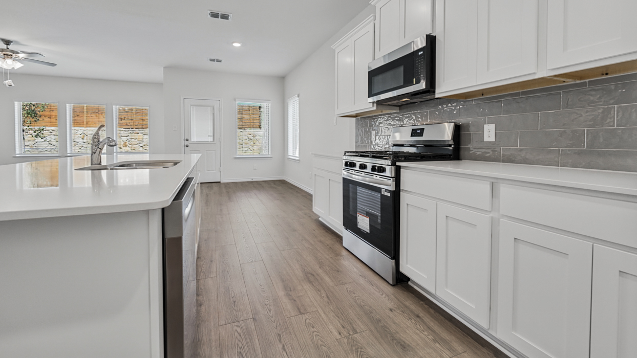 Ivery II Floorplan Elevation B Kitchen Gallery Image - Silverado in Aubrey, TX