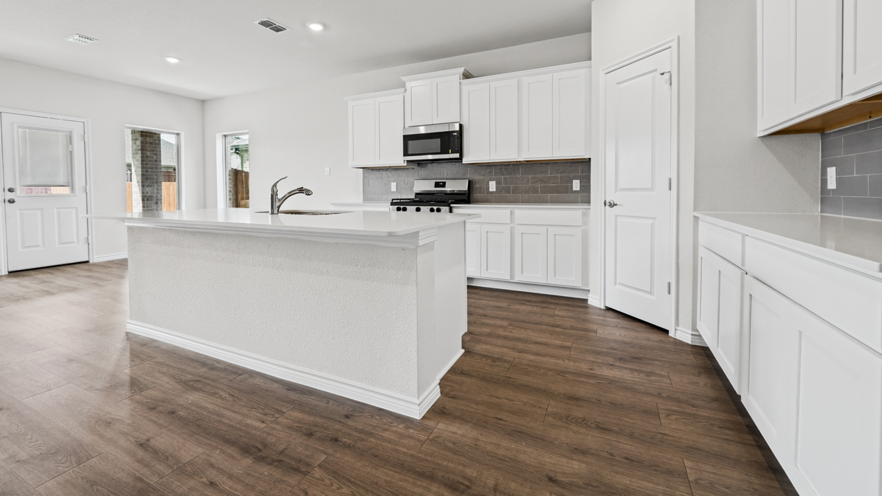 Ivery II Floorplan Elevation A Kitchen Gallery Image - Silverado in Aubrey, TX