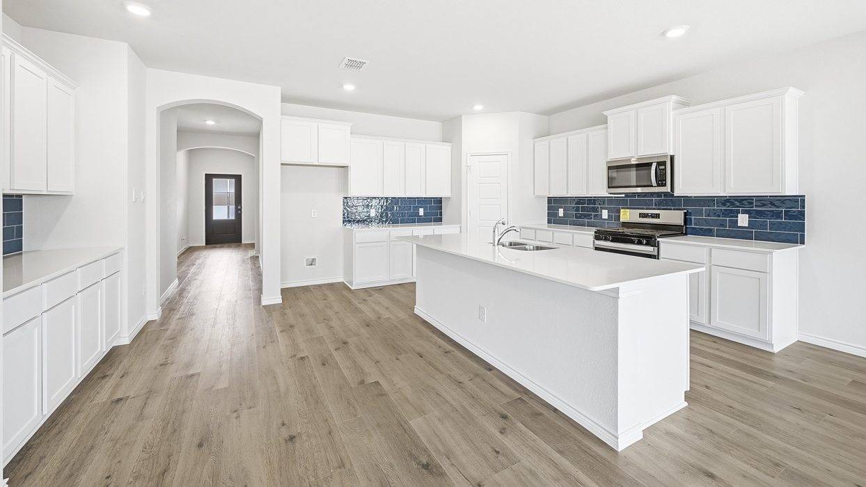 Ivery II Floorplan Elevation B Kitchen Gallery Image - Silverado in Aubrey, TX