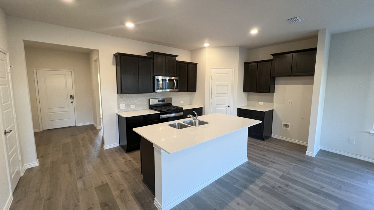 Copaiba Floorplan Elevation B Kitchen Gallery Image - Silverado in Aubrey, TX