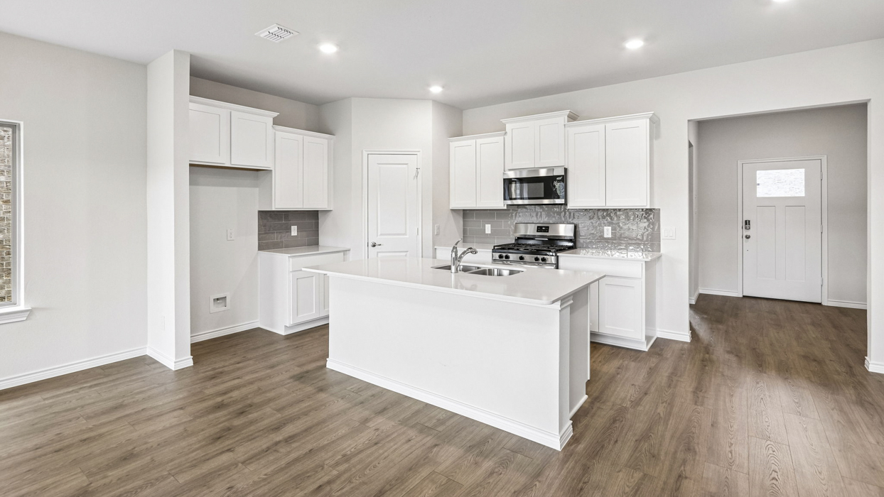 Copaiba Floorplan Elevation A Kitchen Gallery Image - Silverado in Aubrey, TX