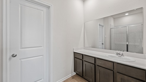 X40O Ozark floorplan elevation F Bathroom Gallery Image- Chalk Hill in Celina TX