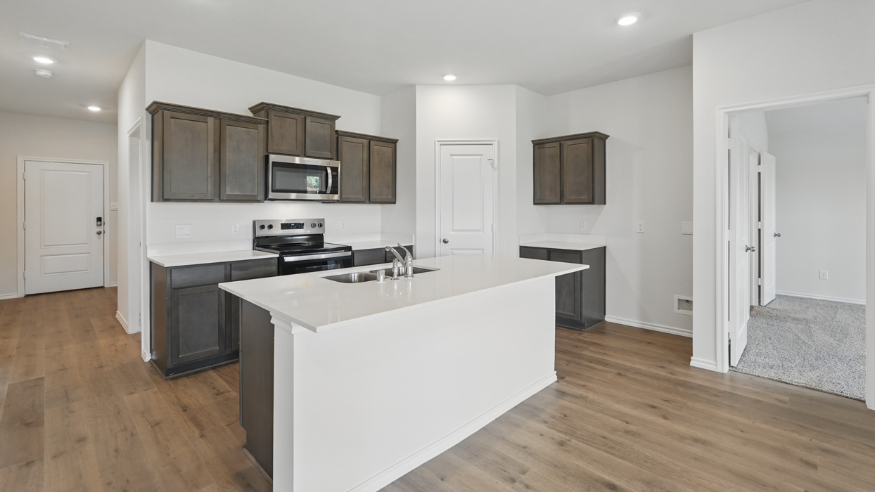 Denton Floorplan Elevation B Kitchen Gallery Image - Whitewing Trails in Princeton, TX
