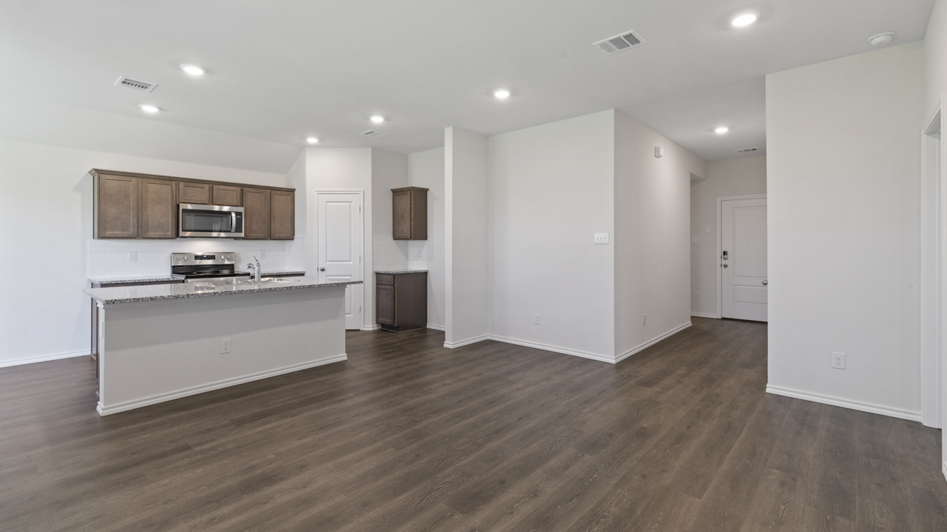 X40A floorplan kitchen rendering at Stonewyck Farms in Ennis TX