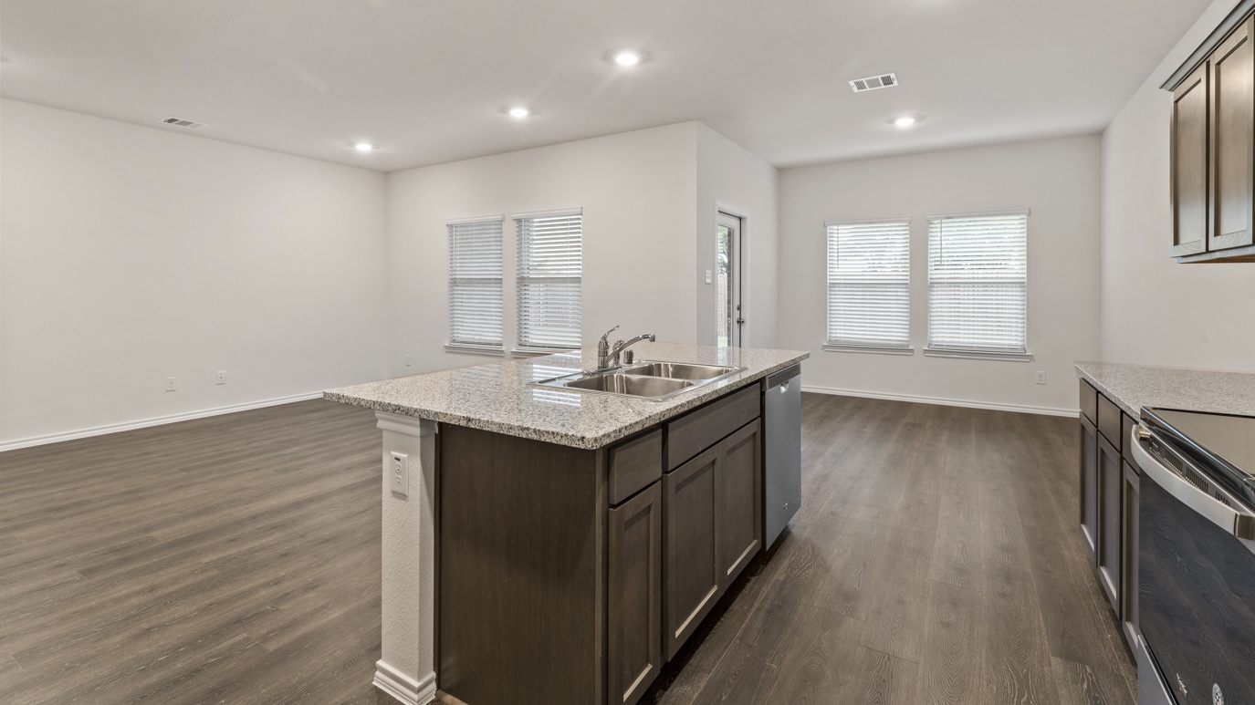 X40N floorplan kitchen rendering at Stonewyck Farms in Ennis TX