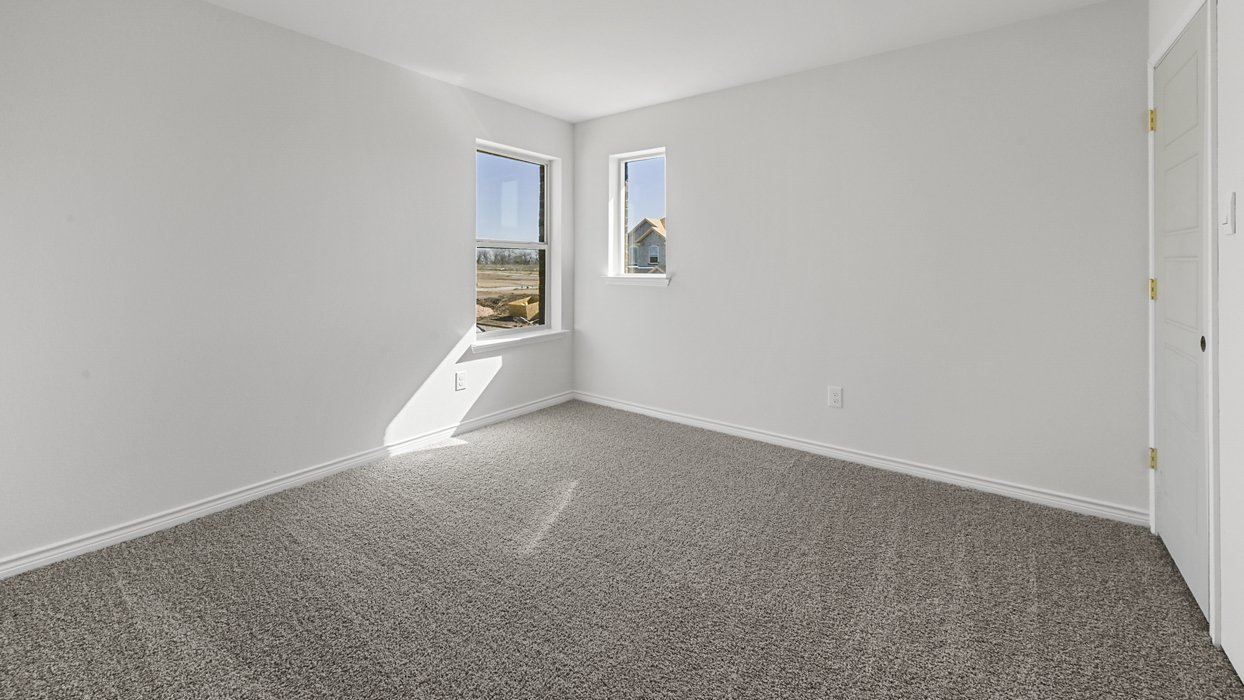 Chester Floorplan Elevation B Bedroom Gallery Image - The Woods at Lindsey Place in Anna, TX
