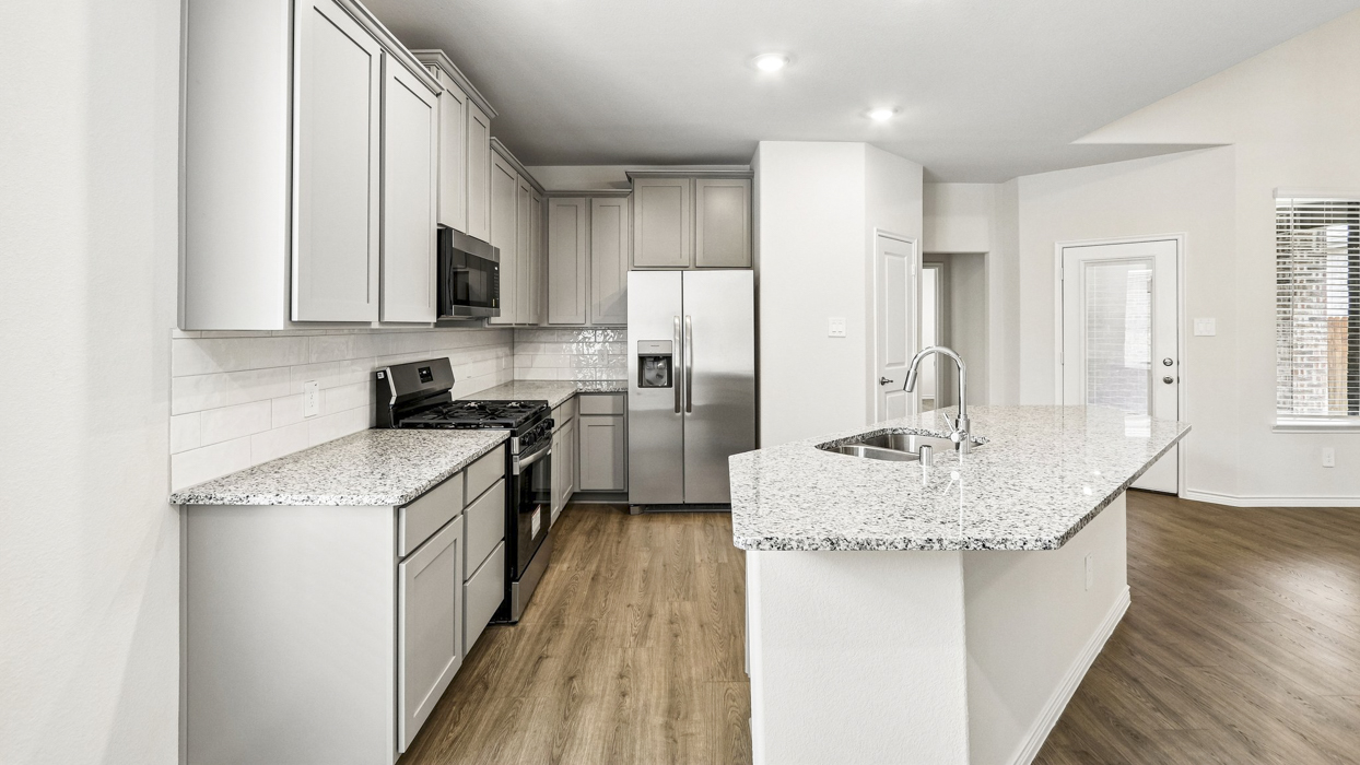Chester Floorplan Elevation A Kitchen Gallery Image - The Woods at Lindsey Place in Anna, TX