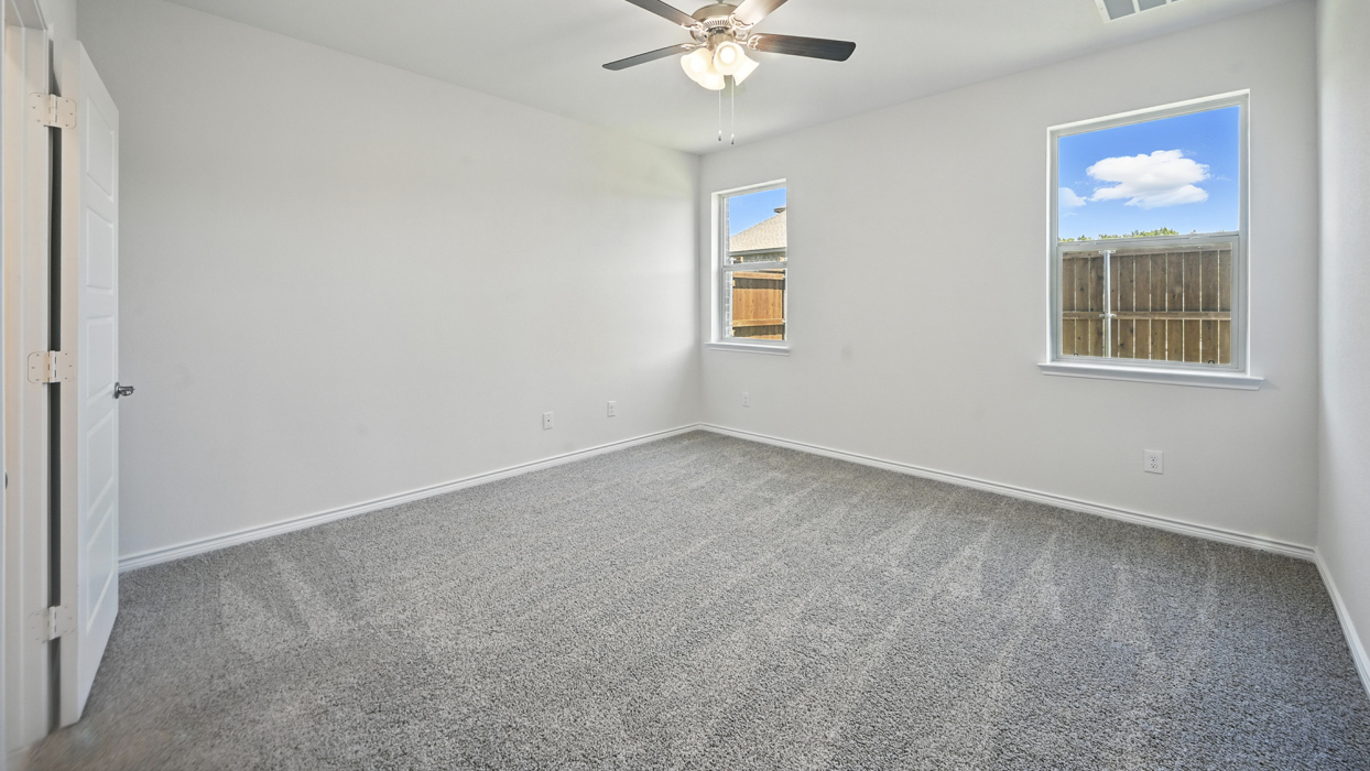 Stafford Floorplan Elevation B Bedroom Gallery Image - The Woods at Lindsey Place in Anna, TX